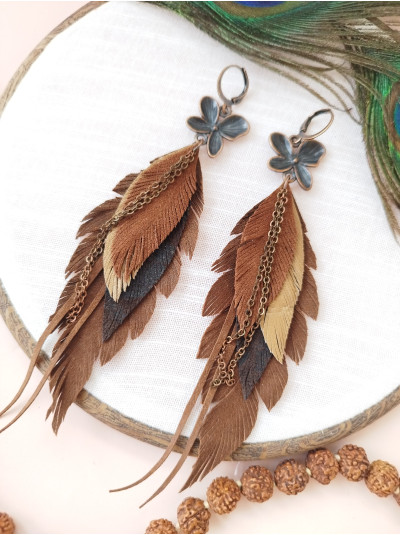 Brown leather feather earrings with chain.