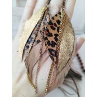 Leopard print brown gold with chain leather feather earrings.