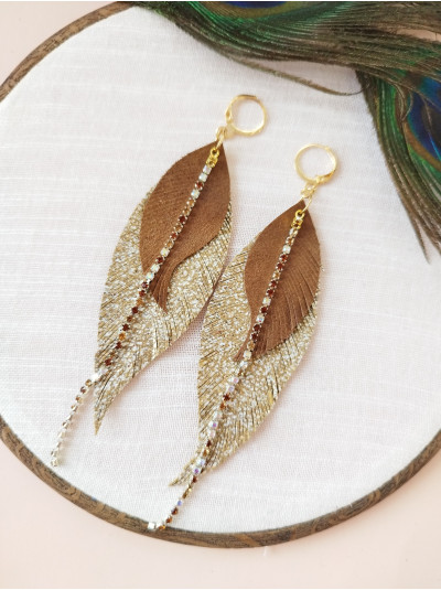 Sand brown gold with crystal chain leather feather earrings.
