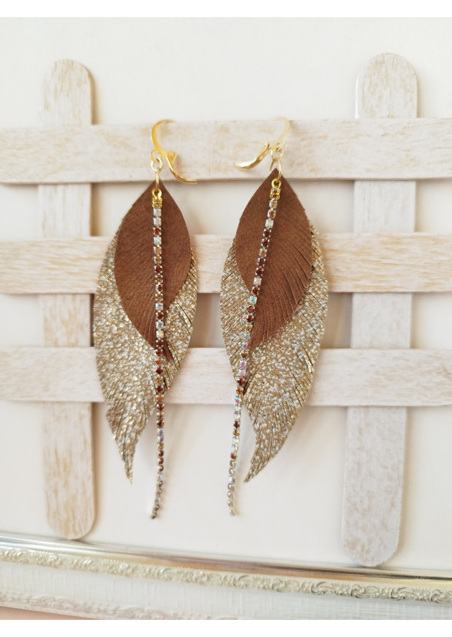 Unique high quality hand cut genuine leather feather earrings.