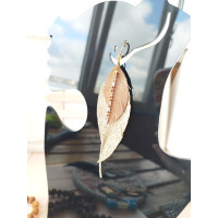 Sand brown gold with crystal chain leather feather earrings.