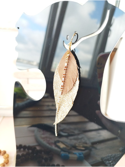 Sand brown gold with crystal chain leather feather earrings.