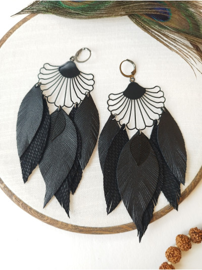 black long leather feather earrings.