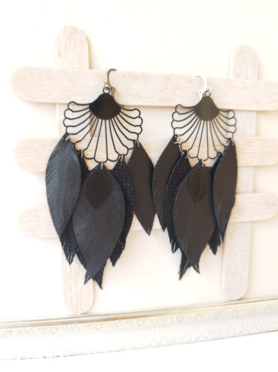 black long leather feather earrings.