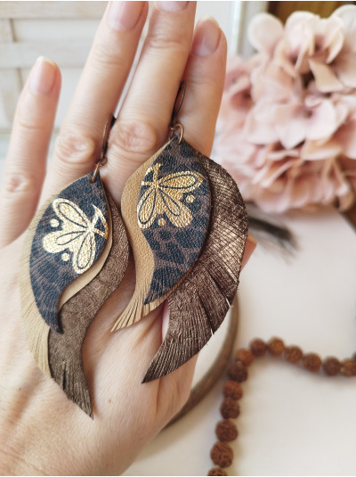brown gold leather wings earrings.