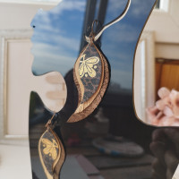 brown gold leather wings earrings.