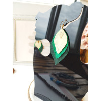 green yellow leather feather earrings.