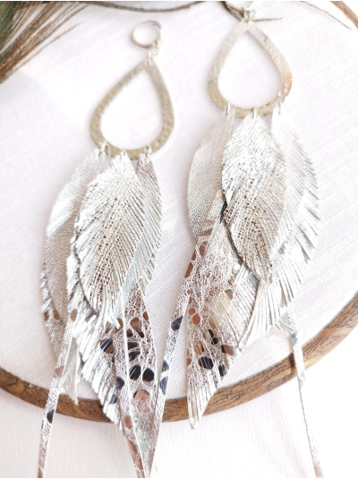 silver extra long leather feather earrings.