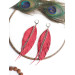 Unique high quality hand cut genuine leather feather earrings.