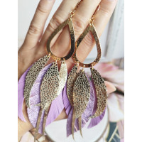 gold lilac extra long leather feather earrings.