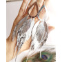 silver extra long leather feather earrings.