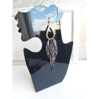 blue green leopard extra long leather feather earrings.