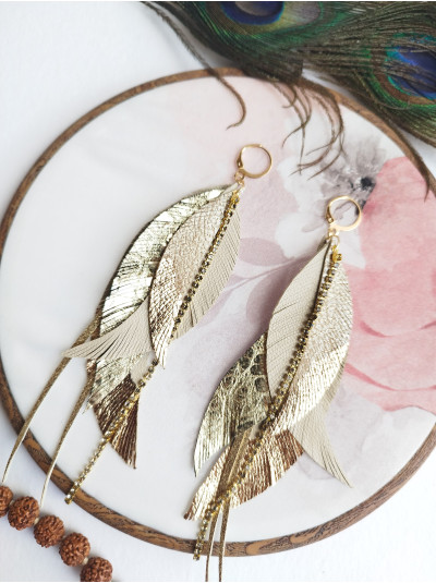 Beige gold leather feather earrings.  
