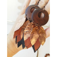 Brown gold leather feather earrings with wood. 