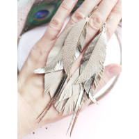 Beige gold leather feathers earrings.