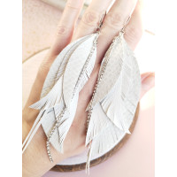 White leather feathers earrings with chain.