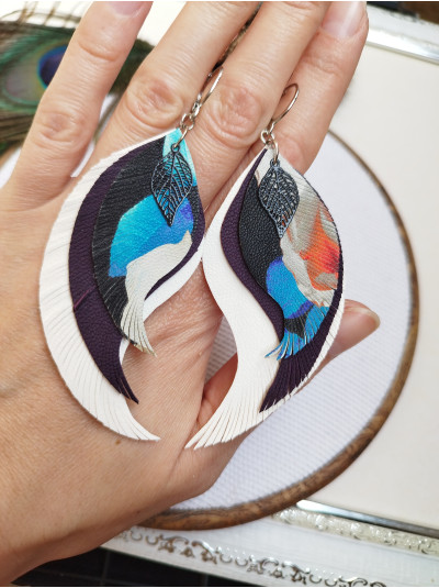 Blue white leather wings earrings.
