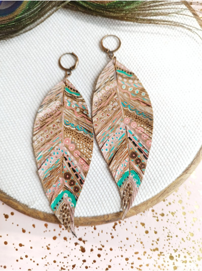 Hand painted native print leather feather earrings.