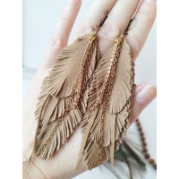 Soft beige with chain leather feather earrings.