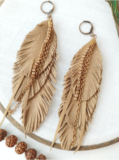 Soft beige with chain leather feather earrings.