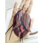 Maroon leather feather earrings.  