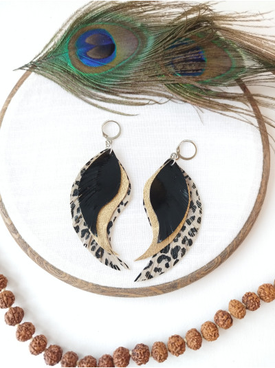Black gold leopard print leather wings earrings.